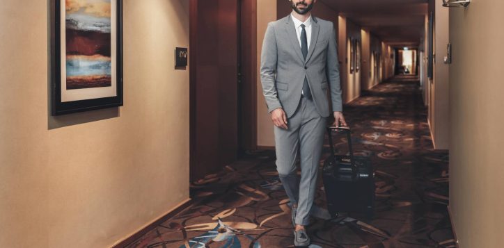 businessman_in-corridor-min