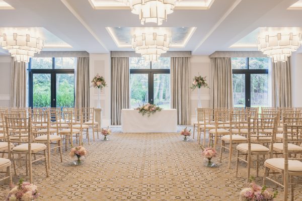Wedding ceremony in monarch Suite at Fairmont Windsor Park hotel near London