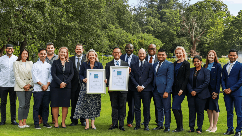 Fairmont Windsor Park team with Green Key sustainability awards in the hotel gardens in Windsor.