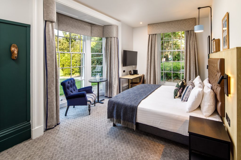Luxury hotel room in Oxford with vintage design, premium amenities, and modern comforts at Mercure Oxford Hawkwell House Hotel.