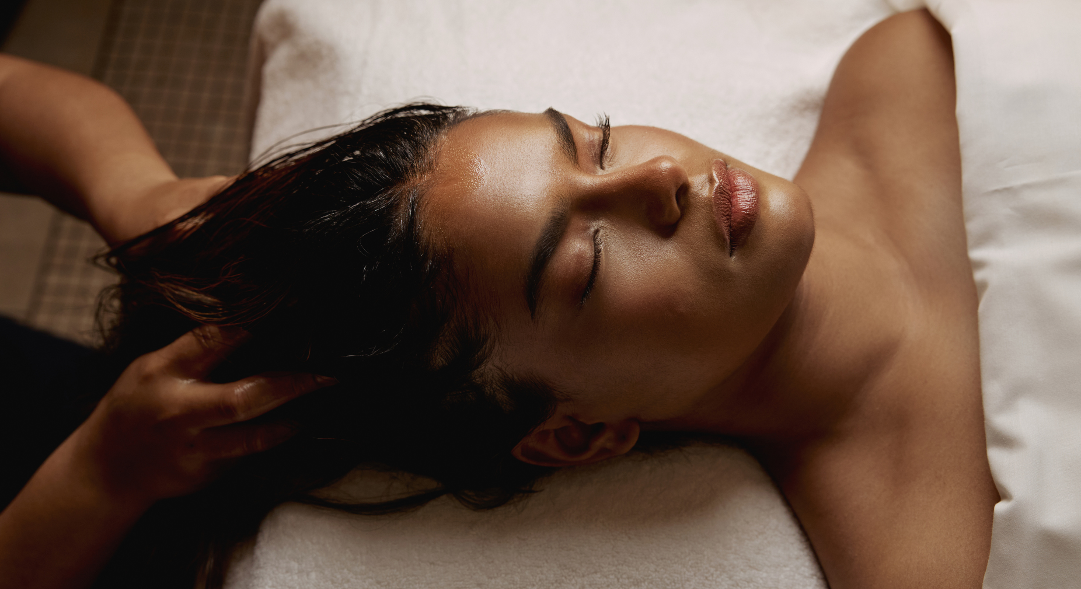 Luxury spa facial treatment at Cape Grace hotel spa in Cape Town, guest relaxing during a rejuvenating skincare ritual.