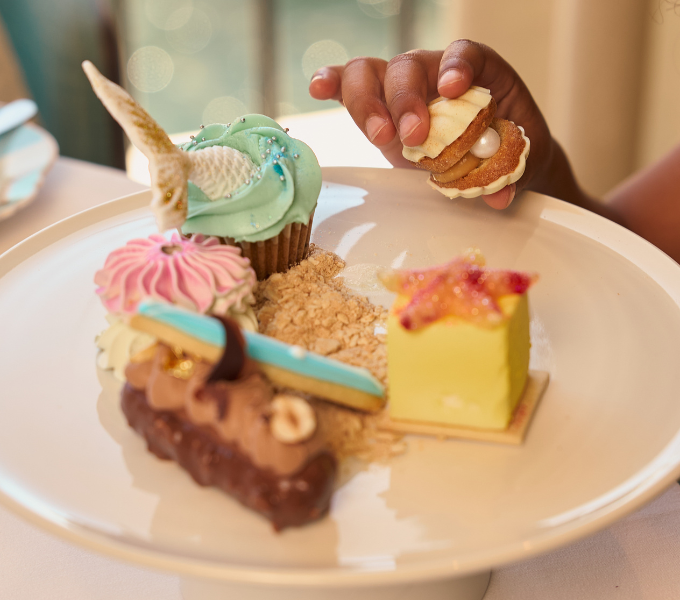 Colourful selection of gourmet desserts from the Kiddies Afternoon Tea at Cape Grace, showcasing playful and family friendly sweet treats.