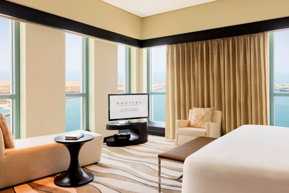 imperial-suite-club-millesime-access-1-king-bed-separate-living-room-sea-and-city-view