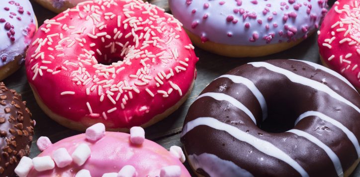 assorteddonutswithchocolatefrostedpinkglazedandsprinklesdonuts-2